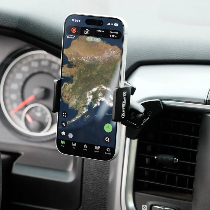 Image of Offroam Phone Mount installed securely in Ram 1500/2500/3500 2013-2018 & Ram Classic 2019-2024. This premium phone mount installs easily without drilling or glue. Spring loaded Universal holder for use with any phone. Perfect placement without blocking screens, driver view, or air flow. Fully adjustable positioning.