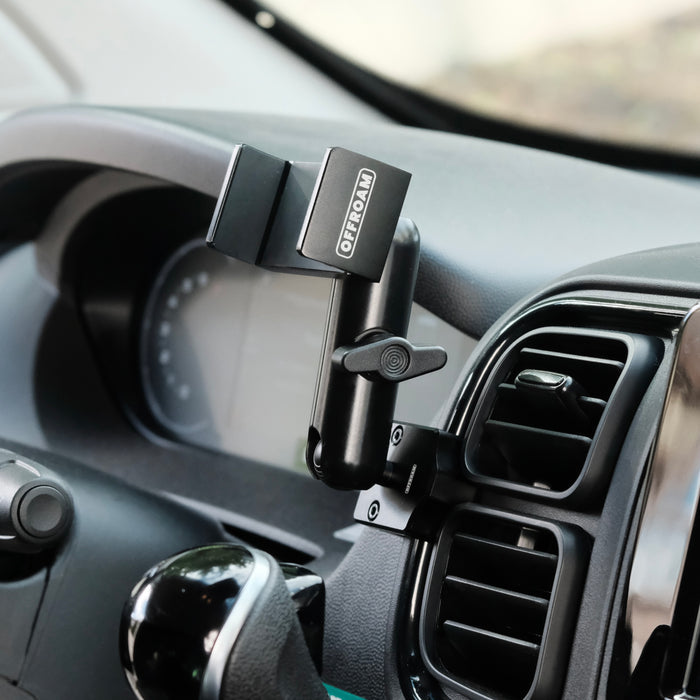 Image of Offroam Phone Mount installed securely in RAM ProMaster 2022-2026. This premium phone mount installs easily without drilling or glue. Spring loaded Universal holder for use with any phone. Perfect placement without blocking screens, driver view, or air flow. Fully adjustable positioning.