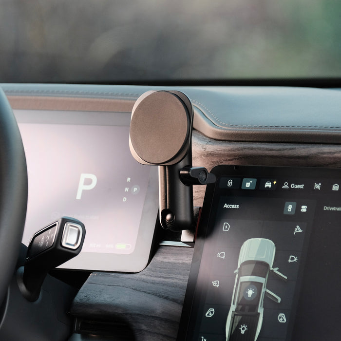 Image of Offroam MagSafe-compatible Phone Mount installed securely in Rivian R1T | R1S 2022-2026. This premium phone mount installs easily without drilling or glue. High force magnets hold phone on any trail, road, or track. Perfect placement without blocking screens, driver view, or air flow. Fully adjustable positioning.