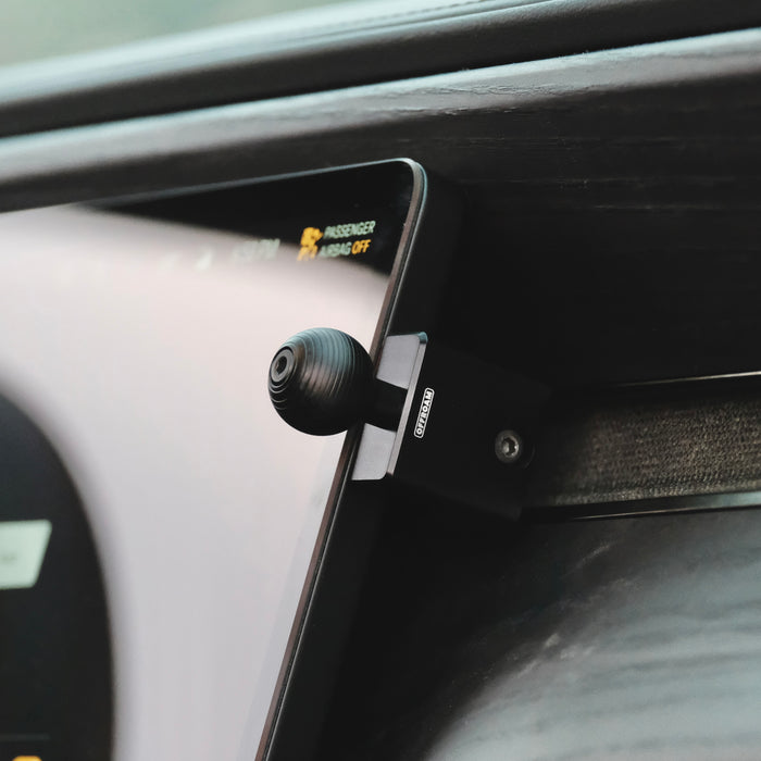 Image of Offroam Mounting Base installed securely in Rivian R1T | R1S 2022-2026. This premium all metal phone mounting base installs easily without drilling or glue. Perfect placement without blocking screens, driver view, or air flow.