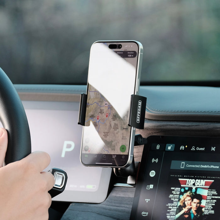 Image of Offroam Phone Mount installed securely in Rivian R1T | R1S 2022-2026. This premium phone mount installs easily without drilling or glue. Spring loaded Universal holder for use with any phone. Perfect placement without blocking screens, driver view, or air flow. Fully adjustable positioning.