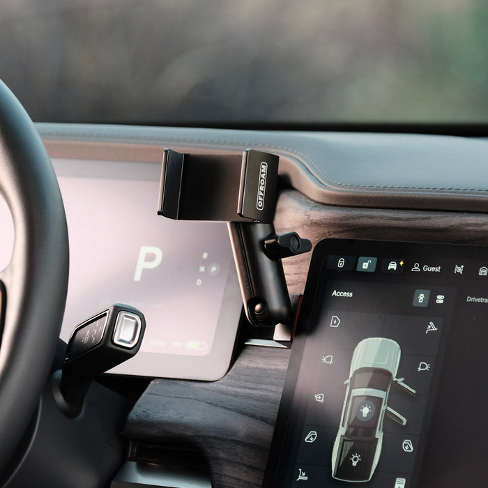 Image of Offroam Phone Mount installed securely in Rivian R1T | R1S 2022-2026. This premium phone mount installs easily without drilling or glue. Spring loaded Universal holder for use with any phone. Perfect placement without blocking screens, driver view, or air flow. Fully adjustable positioning.