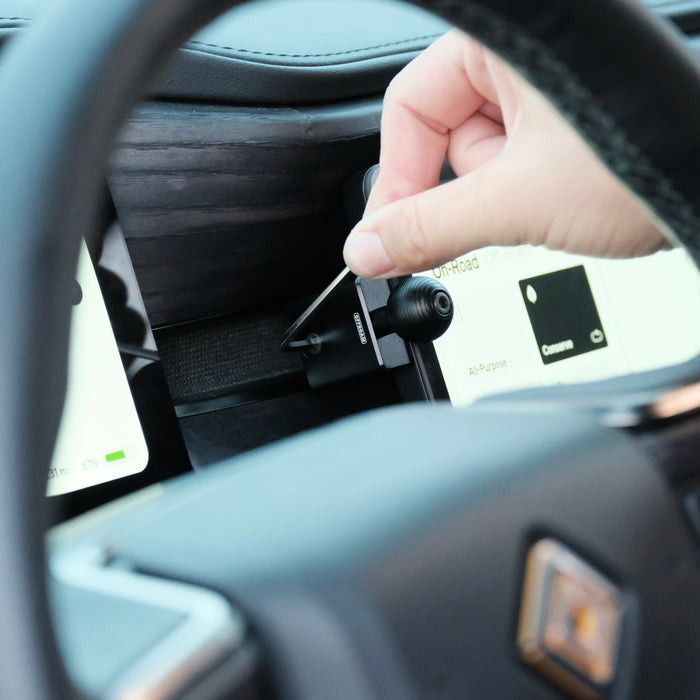 Image of Offroam Mounting Base installed securely in Rivian R1T | R1S 2022-2026. This premium all metal phone mounting base installs easily without drilling or glue. Perfect placement without blocking screens, driver view, or air flow.