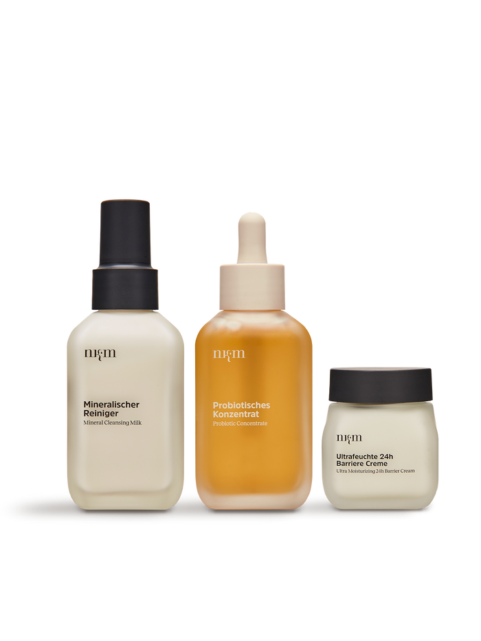 Angeordnete Produkte von nkm: Mineralischer Reiniger, Probiotisches Konzentrat, Ultrafeuchte 24h Barriere Creme