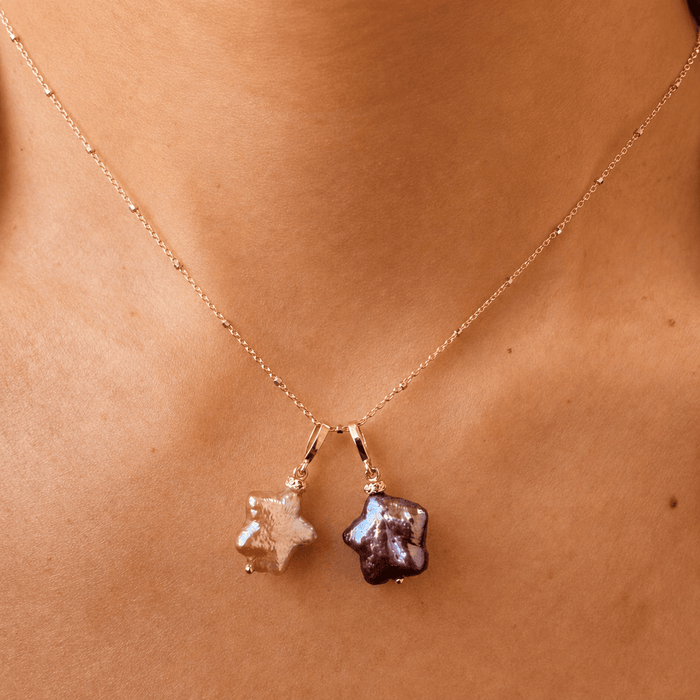 14K solid gold chain with pearl charms shaped as stars and 14K gold bails.