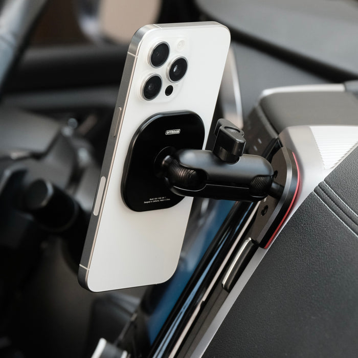 Image of Offroam MagSafe-compatible Phone Mount installed securely in Subaru Ascent 2019-2022. This premium phone mount installs easily without drilling or glue. High force magnets hold phone on any trail, road, or track. Perfect placement without blocking screens, driver view, or air flow. Fully adjustable positioning.