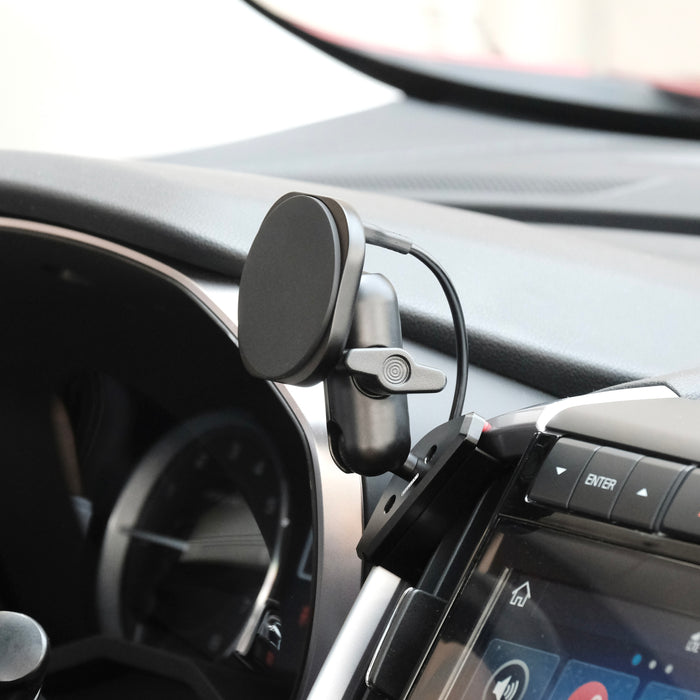 Image of Offroam MagSafe-compatible Phone Mount installed securely in Subaru Ascent 2019-2022. This premium phone mount installs easily without drilling or glue. High force magnets hold phone on any trail, road, or track. Perfect placement without blocking screens, driver view, or air flow. Fully adjustable positioning.