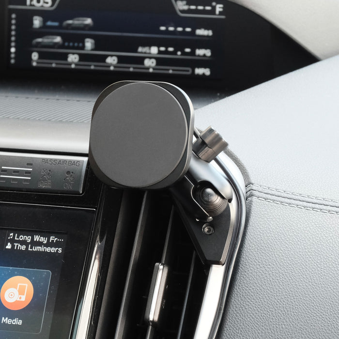 Image of Offroam MagSafe-compatible Phone Mount installed securely in Subaru Ascent 2019-2022. This premium phone mount installs easily without drilling or glue. High force magnets hold phone on any trail, road, or track. Perfect placement without blocking screens, driver view, or air flow. Fully adjustable positioning.