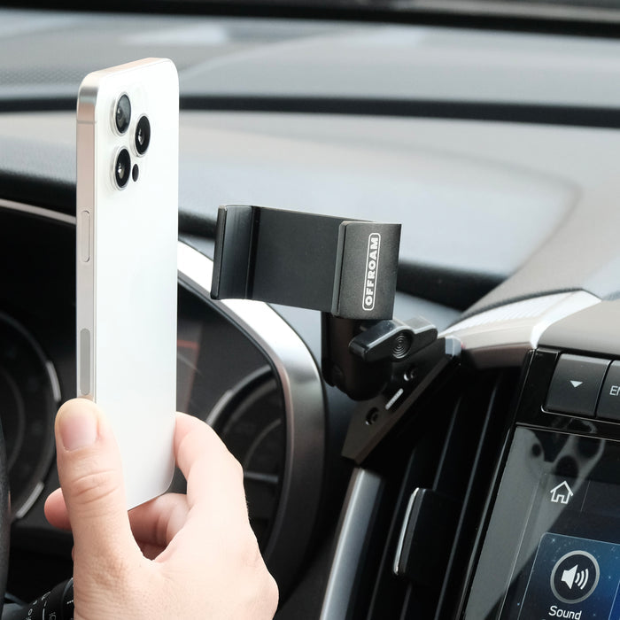 Image of Offroam Phone Mount installed securely in Subaru Ascent 2019-2022. This premium phone mount installs easily without drilling or glue. Spring loaded Universal holder for use with any phone. Perfect placement without blocking screens, driver view, or air flow. Fully adjustable positioning.
