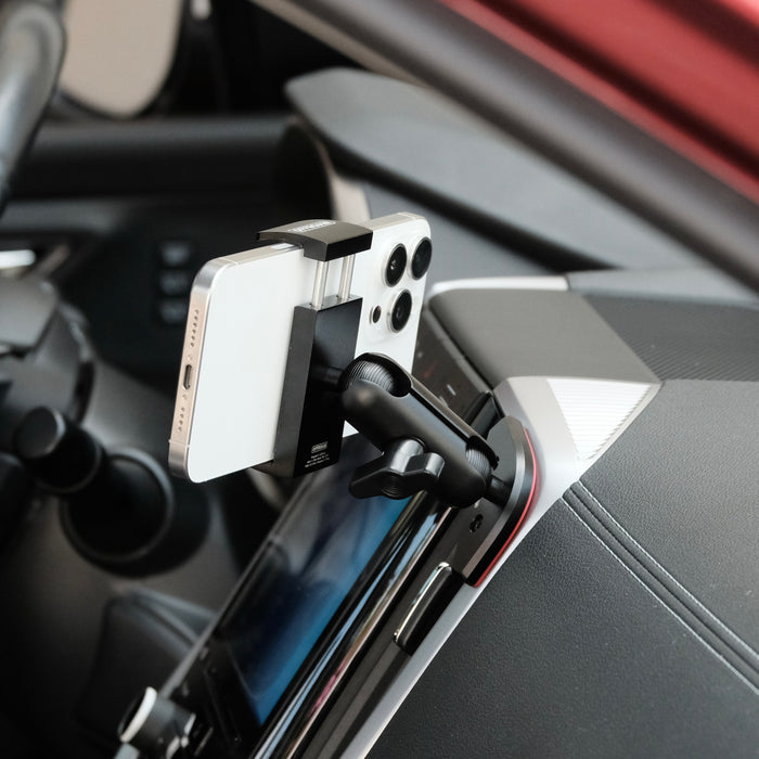 Image of Offroam Phone Mount installed securely in Subaru Ascent 2019-2022. This premium phone mount installs easily without drilling or glue. Spring loaded Universal holder for use with any phone. Perfect placement without blocking screens, driver view, or air flow. Fully adjustable positioning.