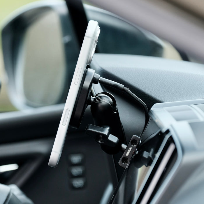 Image of Offroam MagSafe-compatible Phone Mount installed securely in Subaru Ascent 2023-2026. This premium phone mount installs easily without drilling or glue. High force magnets hold phone on any trail, road, or track. Perfect placement without blocking screens, driver view, or air flow. Fully adjustable positioning.