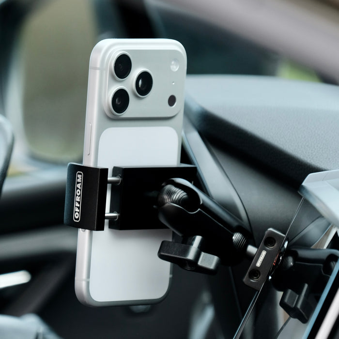 Image of Offroam Phone Mount installed securely in Subaru Ascent 2023-2026. This premium phone mount installs easily without drilling or glue. Spring loaded Universal holder for use with any phone. Perfect placement without blocking screens, driver view, or air flow. Fully adjustable positioning.