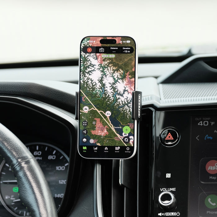 Image of Offroam Phone Mount installed securely in Subaru Ascent 2023-2026. This premium phone mount installs easily without drilling or glue. Spring loaded Universal holder for use with any phone. Perfect placement without blocking screens, driver view, or air flow. Fully adjustable positioning.