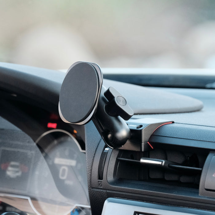 Image of Offroam MagSafe-compatible Phone Mount installed securely in Subaru BRZ 2022-2026 | Toyota GR86 2022-2026. This premium phone mount installs easily without drilling or glue. High force magnets hold phone on any trail, road, or track. Perfect placement without blocking screens, driver view, or air flow. Fully adjustable positioning.
