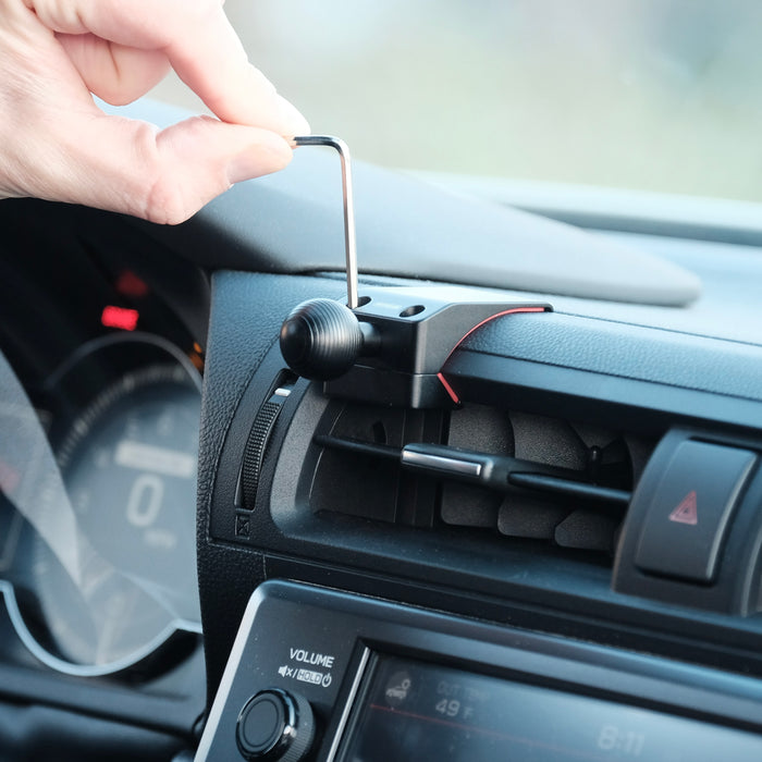 Image of Offroam Mounting Base installed securely in Subaru BRZ 2022-2026 | Toyota GR86 2022-2026. This premium all metal phone mounting base installs easily without drilling or glue. Perfect placement without blocking screens, driver view, or air flow.