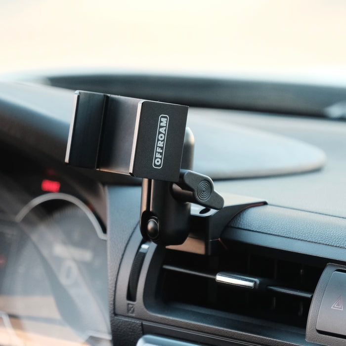 Image of Offroam Phone Mount installed securely in Subaru BRZ 2022-2026 | Toyota GR86 2022-2026. This premium phone mount installs easily without drilling or glue. Spring loaded Universal holder for use with any phone. Perfect placement without blocking screens, driver view, or air flow. Fully adjustable positioning.