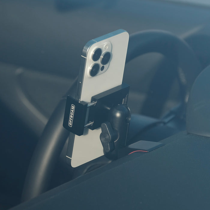 Image of Offroam Phone Mount installed securely in Subaru BRZ 2022-2026 | Toyota GR86 2022-2026. This premium phone mount installs easily without drilling or glue. Spring loaded Universal holder for use with any phone. Perfect placement without blocking screens, driver view, or air flow. Fully adjustable positioning.