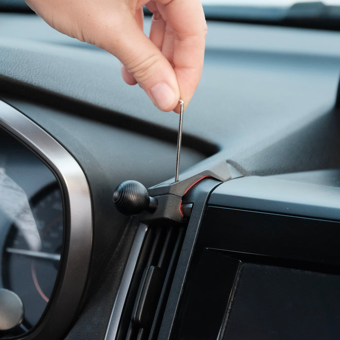 Image of Offroam Mounting Base installed securely in Subaru Crosstrek 2018-2023 | Forester 2019-2024| Impreza 2017-2023. This premium all metal phone mounting base installs easily without drilling or glue. Perfect placement without blocking screens, driver view, or air flow.