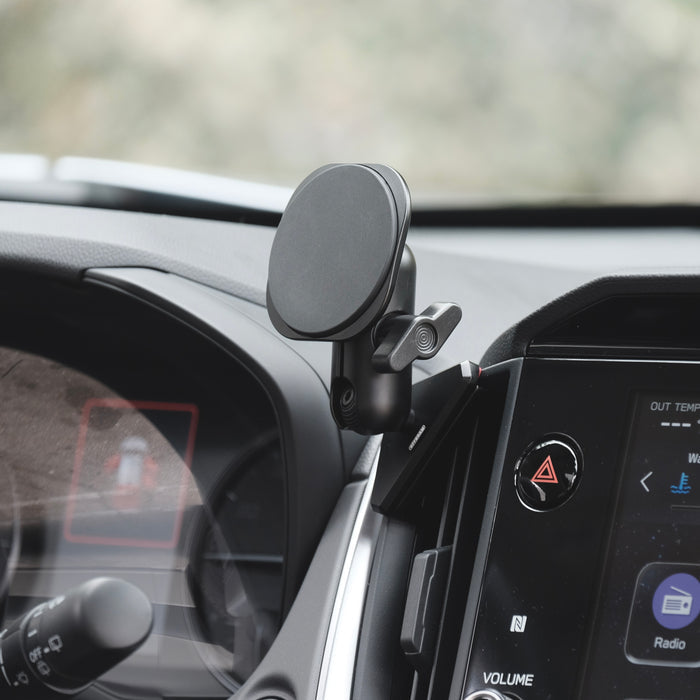 Image of Offroam MagSafe-compatible Phone Mount installed securely in Subaru Crosstrek 2024-2026 | Impreza 2024-2026 | WRX 2022-2026. This premium phone mount installs easily without drilling or glue. High force magnets hold phone on any trail, road, or track. Perfect placement without blocking screens, driver view, or air flow. Fully adjustable positioning.