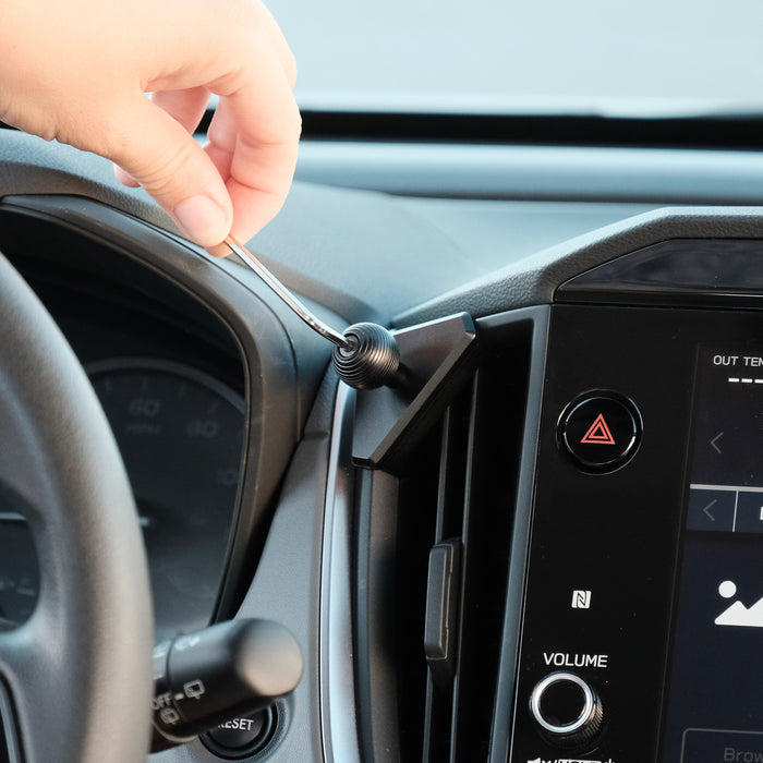 Image of Offroam Mounting Base installation for Subaru Crosstrek 2024-2026 | Impreza 2024-2026 | WRX 2022-2026. This premium all metal phone mounting base installs easily without drilling or glue. Perfect placement without blocking screens, driver view, or air flow.