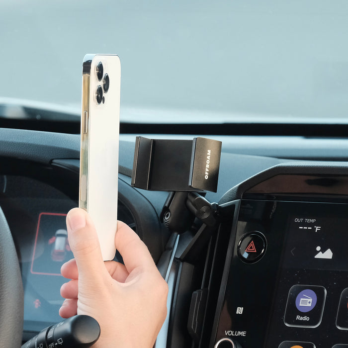 Image of Offroam Phone Mount installed securely in Subaru Crosstrek 2024-2026 | Impreza 2024-2026 | WRX 2022-2026. This premium phone mount installs easily without drilling or glue. Spring loaded Universal holder for use with any phone. Perfect placement without blocking screens, driver view, or air flow. Fully adjustable positioning.