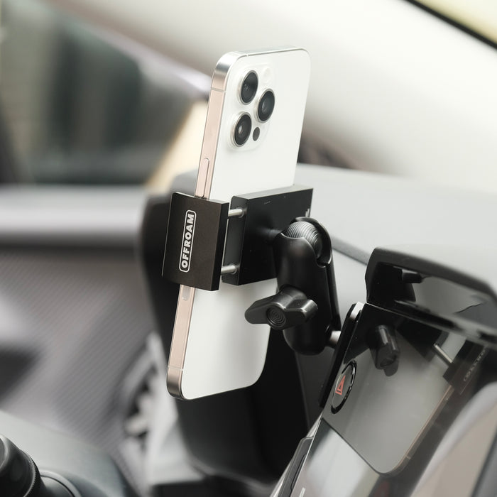 Image of Offroam Phone Mount installed securely in Subaru Crosstrek 2024-2026 | Impreza 2024-2026 | WRX 2022-2026. This premium phone mount installs easily without drilling or glue. Spring loaded Universal holder for use with any phone. Perfect placement without blocking screens, driver view, or air flow. Fully adjustable positioning.