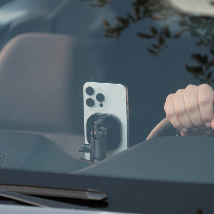 Image of Offroam MagSafe-compatible Phone Mount installed securely in Subaru Forester 2025-2026. This premium phone mount installs easily without drilling or glue. High force magnets hold phone on any trail, road, or track. Perfect placement without blocking screens, driver view, or air flow. Fully adjustable positioning.
