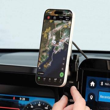 Image of Offroam MagSafe-compatible Phone Mount installed securely in Subaru Outback 2026. This premium phone mount installs easily without drilling or glue. High force magnets hold phone on any trail, road, or track. Perfect placement without blocking screens, driver view, or air flow. Fully adjustable positioning.
