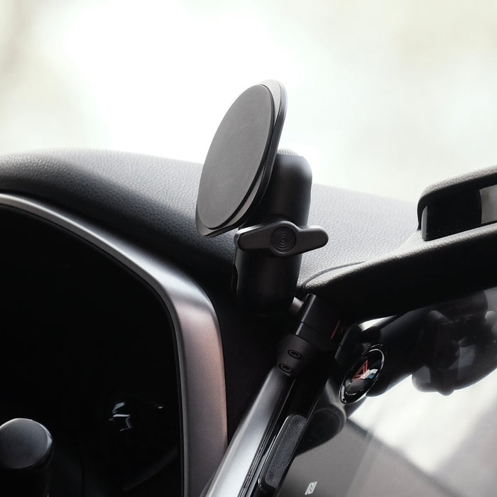 Image of Offroam MagSafe-compatible Phone Mount installed securely in Subaru Outback | Legacy 2020-2025. This premium phone mount installs easily without drilling or glue. High force magnets hold phone on any trail, road, or track. Perfect placement without blocking screens, driver view, or air flow. Fully adjustable positioning.