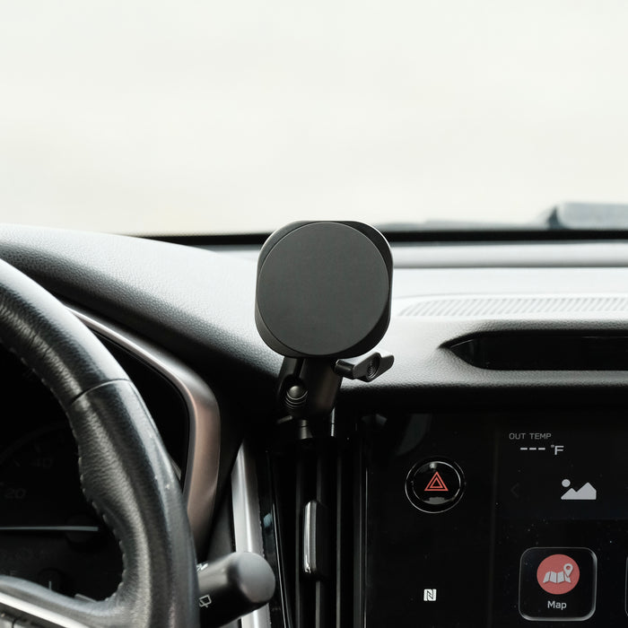 Image of Offroam MagSafe-compatible Phone Mount installed securely in Subaru Outback | Legacy 2020-2025. This premium phone mount installs easily without drilling or glue. High force magnets hold phone on any trail, road, or track. Perfect placement without blocking screens, driver view, or air flow. Fully adjustable positioning.