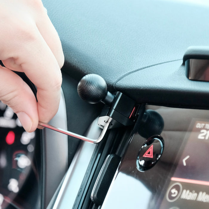 Image of Offroam Mounting Base installed securely in Subaru Outback | Legacy 2020-2025. This premium all metal phone mounting base installs easily without drilling or glue. Perfect placement without blocking screens, driver view, or air flow.