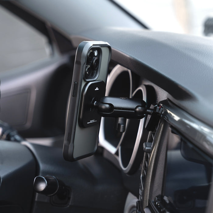 Image of Offroam MagSafe-compatible Phone Mount installed securely in Toyota 4Runner 2003-2009. This premium phone mount installs easily without drilling or glue. High force magnets hold phone on any trail, road, or track. Perfect placement without blocking screens, driver view, or air flow. Fully adjustable positioning.