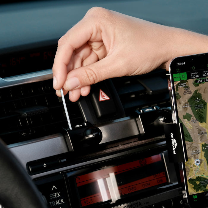 Image of Offroam Mounting Bases installed securely in Toyota 4Runner 2010-2013. This premium all metal phone mounting base installs easily without drilling or glue. Perfect placement without blocking screens, driver view, or air flow.