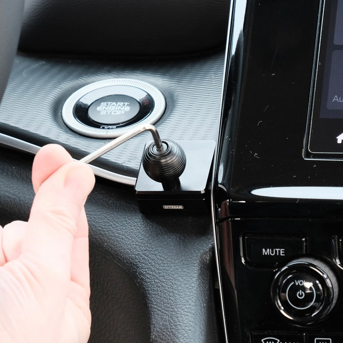 Image of Offroam Mounting Base installed securely in Toyota 4Runner 2010-2024 & Jeep Grand Cherokee 2022-2026. This premium all metal phone mounting base installs easily without drilling or glue. Perfect placement without blocking screens, driver view, or air flow.