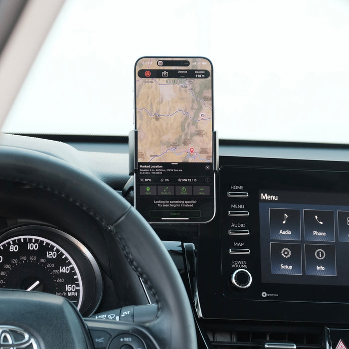 Image of Offroam Phone Mount installed securely in Toyota Camry 2021-2024. This premium phone mount installs easily without drilling or glue. Spring loaded Universal holder for use with any phone. Perfect placement without blocking screens, driver view, or air flow. Fully adjustable positioning.