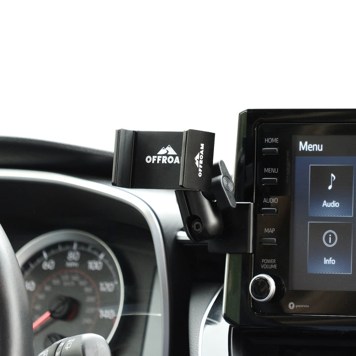 Image of Offroam Phone Mount installed securely in Toyota Corolla 2020-2026 | Corolla Cross 2022-2026. This premium phone mount installs easily without drilling or glue. Spring loaded Universal holder for use with any phone. Perfect placement without blocking screens, driver view, or air flow. Fully adjustable positioning.
