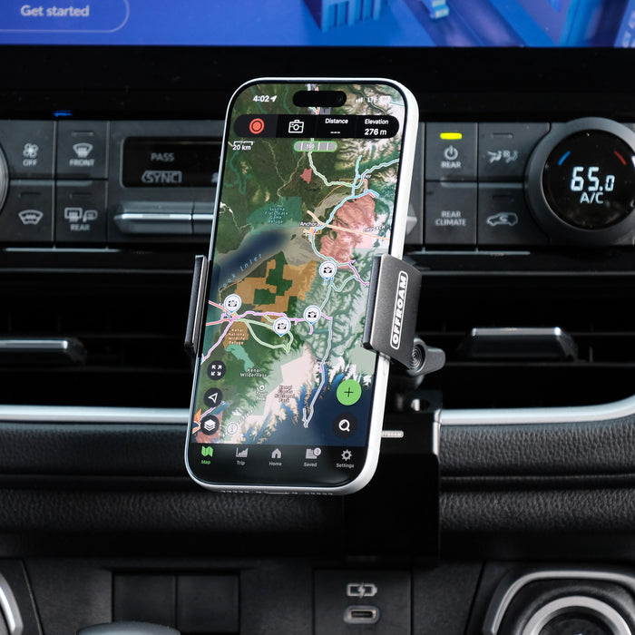 Image of Offroam Phone Mount installed securely in Toyota Grand Highlander 2024-2026. This premium phone mount installs easily without drilling or glue. Spring loaded Universal holder for use with any phone. Perfect placement without blocking screens, driver view, or air flow. Fully adjustable positioning.