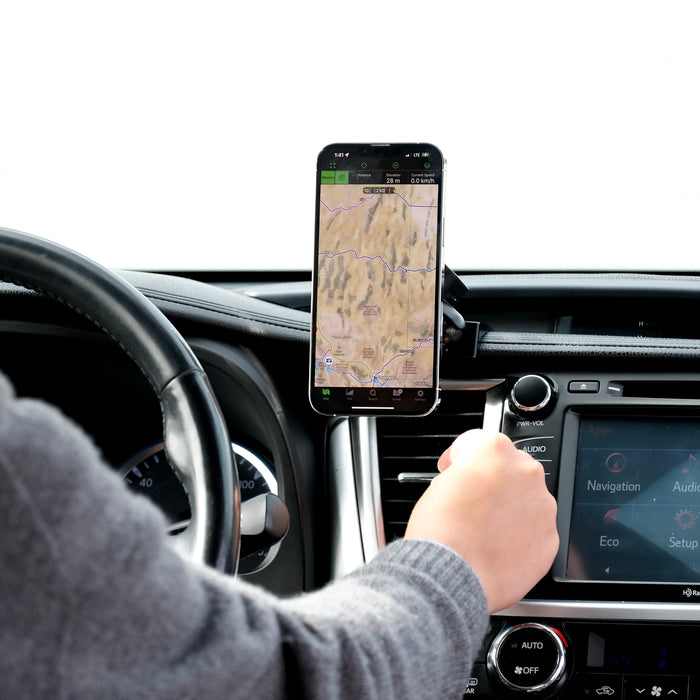 Image of Offroam MagSafe-compatible Phone Mount installed securely in Toyota Highlander 2014-2019. This premium phone mount installs easily without drilling or glue. High force magnets hold phone on any trail, road, or track. Perfect placement without blocking screens, driver view, or air flow. Fully adjustable positioning.