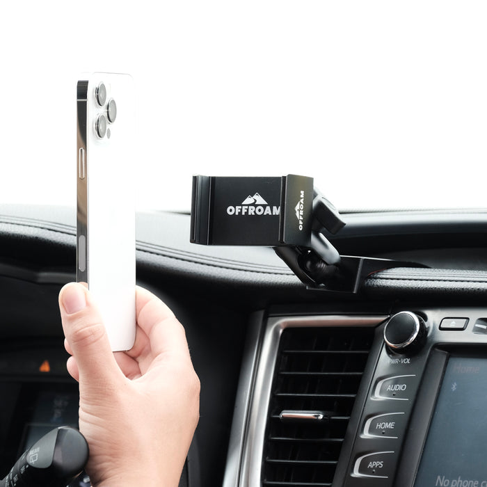 Image of Offroam Phone Mount installed securely in Toyota Highlander 2014-2019. This premium phone mount installs easily without drilling or glue. Spring loaded Universal holder for use with any phone. Perfect placement without blocking screens, driver view, or air flow. Fully adjustable positioning.