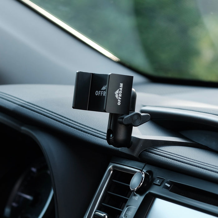 Image of Offroam Phone Mount installed securely in Toyota Highlander 2014-2019. This premium phone mount installs easily without drilling or glue. Spring loaded Universal holder for use with any phone. Perfect placement without blocking screens, driver view, or air flow. Fully adjustable positioning.
