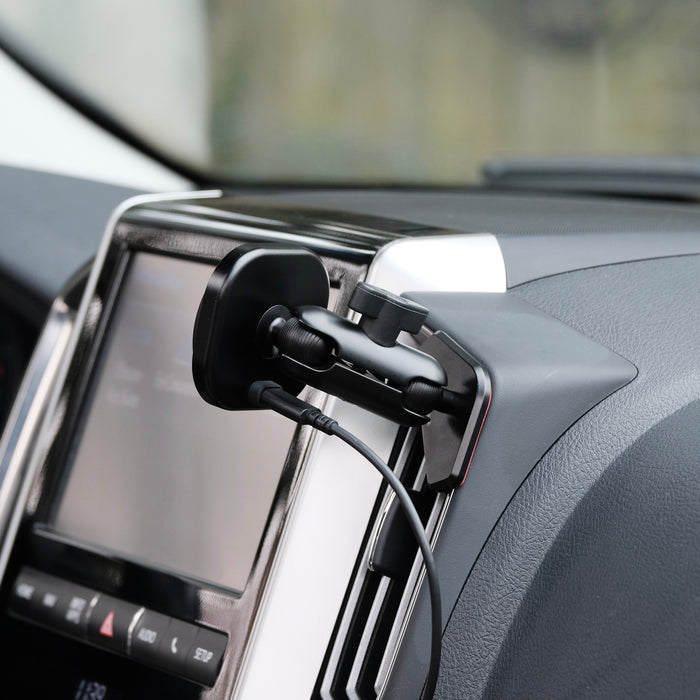 Image of Offroam MagSafe-compatible Phone Mount installed securely in Toyota Land Cruiser 200 2016-2021. This premium phone mount installs easily without drilling or glue. High force magnets hold phone on any trail, road, or track. Perfect placement without blocking screens, driver view, or air flow. Fully adjustable positioning.