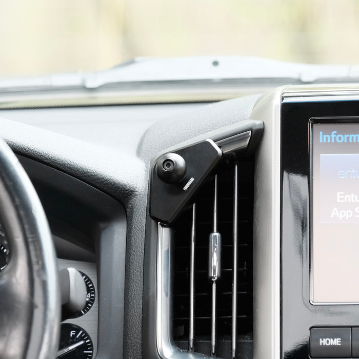 Image of Offroam Mounting Base installed securely in Toyota Land Cruiser 200 2016-2021. This premium all metal phone mounting base installs easily without drilling or glue. Perfect placement without blocking screens, driver view, or air flow.