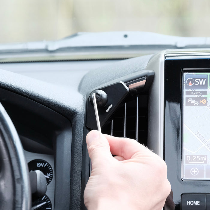 Image of Offroam Mounting Base installation in Toyota Land Cruiser 200 2016-2021. This premium all metal phone mounting base installs easily without drilling or glue. Perfect placement without blocking screens, driver view, or air flow.