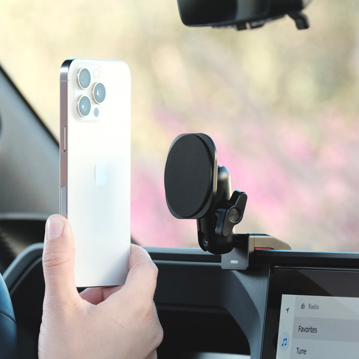 Image of Offroam MagSafe-compatible Phone Mount installed securely in Toyota Land Cruiser 250 2024-2027. This premium phone mount installs easily without drilling or glue. High force magnets hold phone on any trail, road, or track. Perfect placement without blocking screens, driver view, or air flow. Fully adjustable positioning.