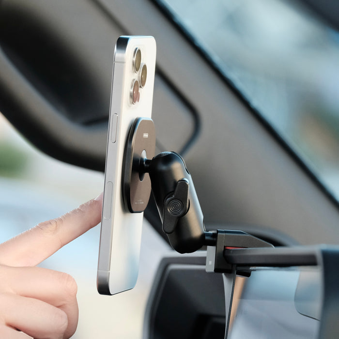 Image of Offroam MagSafe-compatible Phone Mount installed securely in Toyota Land Cruiser 250 2024-2027. This premium phone mount installs easily without drilling or glue. High force magnets hold phone on any trail, road, or track. Perfect placement without blocking screens, driver view, or air flow. Fully adjustable positioning.