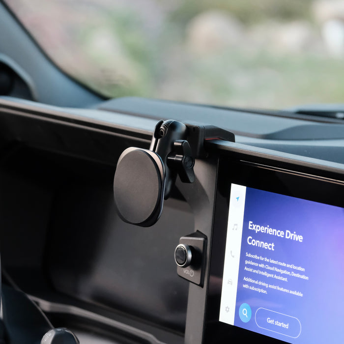 Image of Offroam MagSafe-compatible Phone Mount installed securely in Toyota Land Cruiser 250 2024-2027. This premium phone mount installs easily without drilling or glue. High force magnets hold phone on any trail, road, or track. Perfect placement without blocking screens, driver view, or air flow. Fully adjustable positioning.