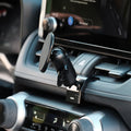 Image of Offroam MagSafe-compatible Phone Mount installed securely in Toyota RAV4 2019-2025. This premium phone mount installs easily without drilling or glue. High force magnets hold phone on any trail, road, or track. Perfect placement without blocking screens, driver view, or air flow. Fully adjustable positioning.