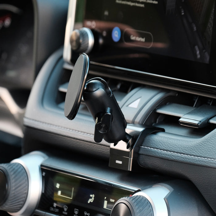 Image of Offroam MagSafe-compatible Phone Mount installed securely in Toyota RAV4 2019-2025. This premium phone mount installs easily without drilling or glue. High force magnets hold phone on any trail, road, or track. Perfect placement without blocking screens, driver view, or air flow. Fully adjustable positioning.