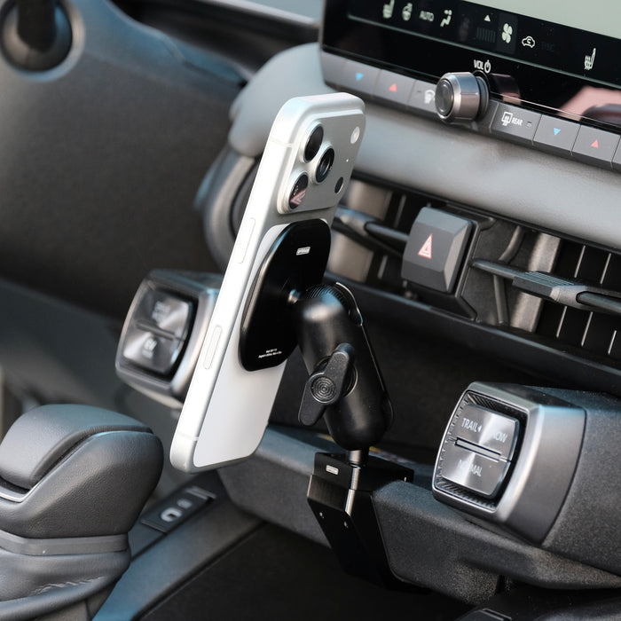 Image of Offroam MagSafe-compatible Phone Mount installed securely in Toyota RAV4 2026. This premium phone mount installs easily without drilling or glue. High force magnets hold phone on any trail, road, or track. Perfect placement without blocking screens, driver view, or air flow. Fully adjustable positioning.