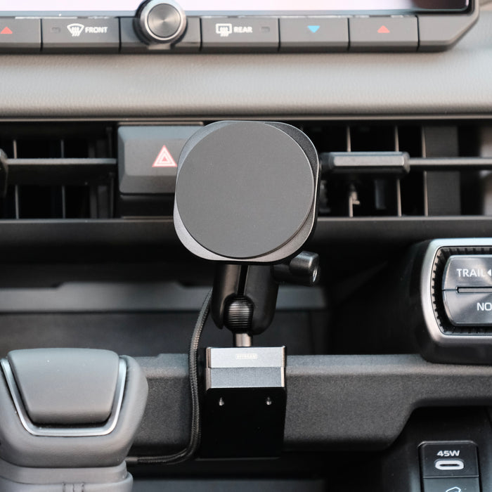 Image of Offroam MagSafe-compatible Phone Mount installed securely in Toyota RAV4 2026. This premium phone mount installs easily without drilling or glue. High force magnets hold phone on any trail, road, or track. Perfect placement without blocking screens, driver view, or air flow. Fully adjustable positioning.